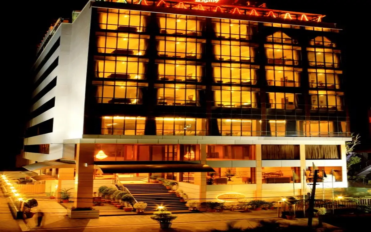 Classic Sarovar Portico's hotel facade on Manjalikulam Road, as published by the operator.