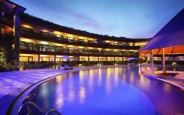 Pool and accommodation buildings published by Uday Suites; this does not establish the assigned room, its view or current pool availability.