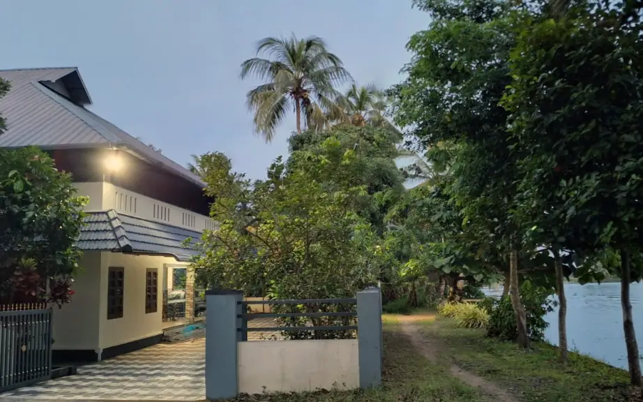 Rivermist Homestay building beside the water at Kandankary, as submitted to Kerala Tourism.