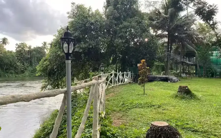 Scenic view of the private villa exterior at Riverside Retreat in Thiruvalla