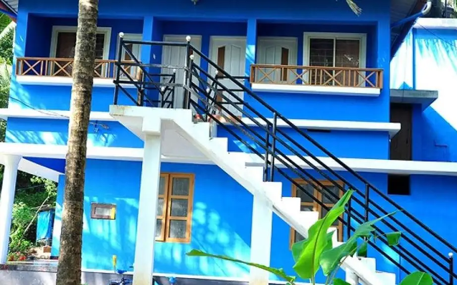 Image submitted for Ushas Homes on its Kerala Tourism provider page; confirm current appearance and the exact room directly.