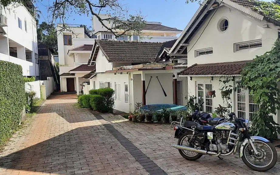 Image submitted for Fenn Hall on its Kerala Tourism provider page; confirm current appearance and the exact room directly.