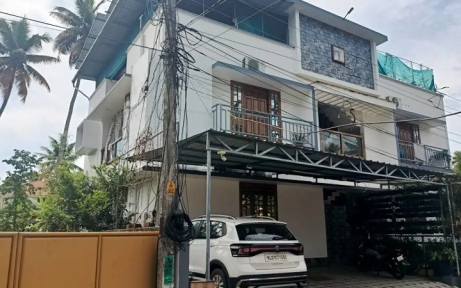 Image submitted for HAPPPYHOMESHOMESTAY on its Kerala Tourism provider page; confirm current appearance and the exact room directly.