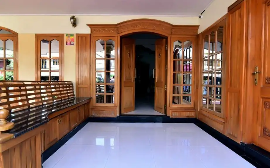 Image submitted for Malar Homes on its Kerala Tourism provider page; confirm current appearance and the exact room directly.