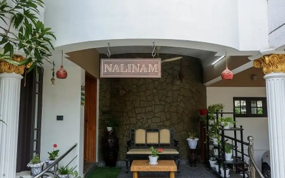 Image submitted for Nalinam Homestay on its Kerala Tourism provider page; confirm current appearance and the exact room directly.