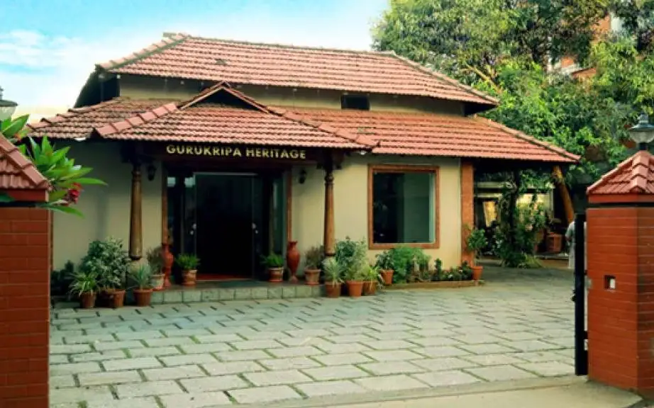 Image submitted for Gurukripa Heritage Hotel on its Kerala Tourism provider page; confirm current appearance and the exact room directly.