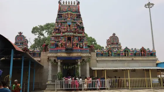 The temple buildings and flagstaff at Chikka Madhure.