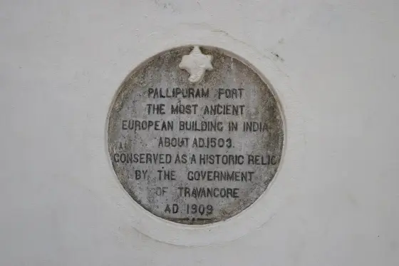The 1909 marble tablet at Pallipuram Fort reading “the most ancient European building in India, about A.D. 1503, conserved as a historic relic by the Government of Travancore”