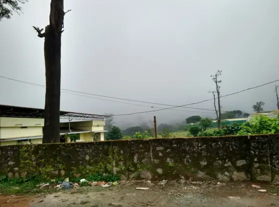Pulayanpara in cloud — the ordinary working weather of this part of the plateau.