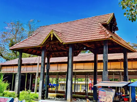 The open-sided pavilion beside the pond.
