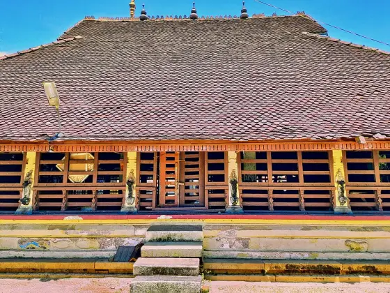 The timber screen beneath a broad tiled roof.
