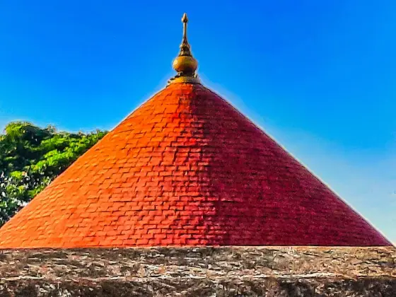 The conical tiled roof of the shrine at Chengannur.