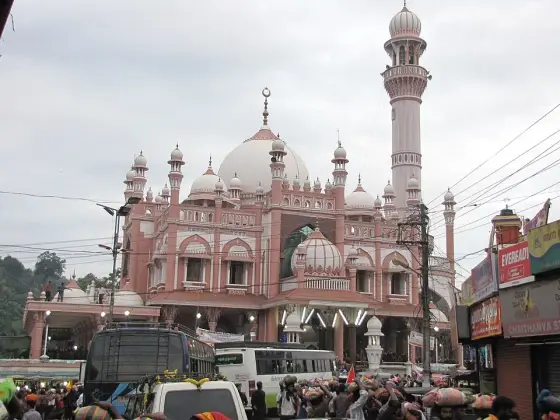 An older photograph of the mosque at Erumeli, with its pink facade.