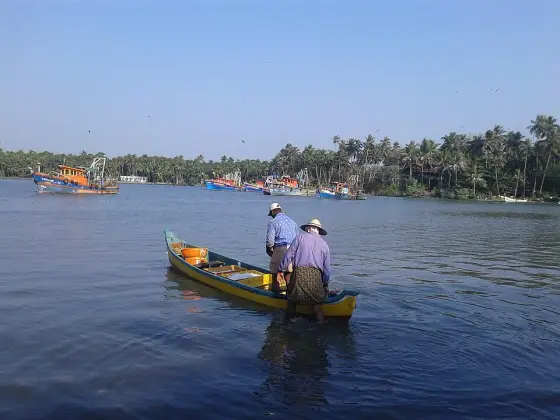 Fishermen working from a boat at Chaliyam.