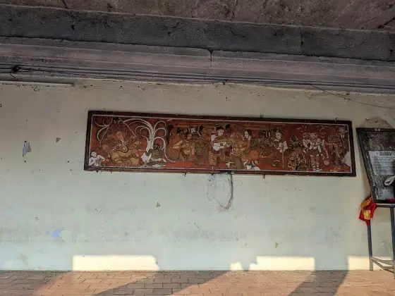 A painted panel of deities at Chengannur.