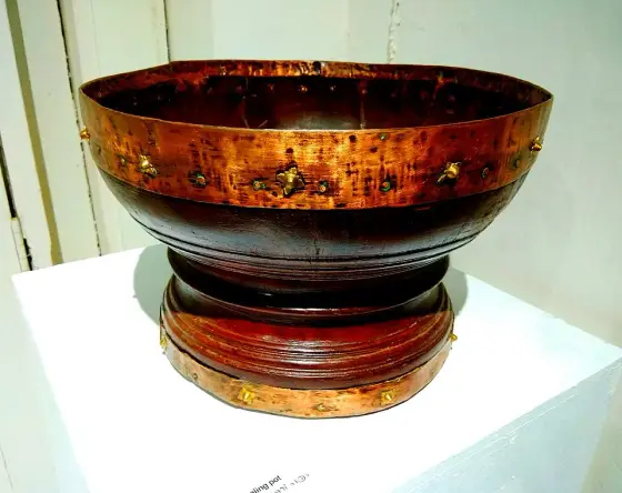 A traditional measuring vessel displayed at the palace.