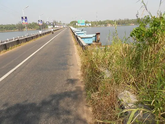 The road across the Thottappally spillway.