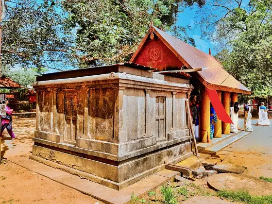 A small shrine enclosure in the Kodungallur temple compound.