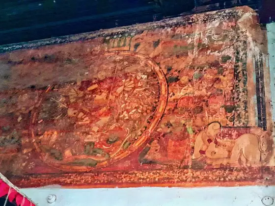 An extended mural across the temple wall.