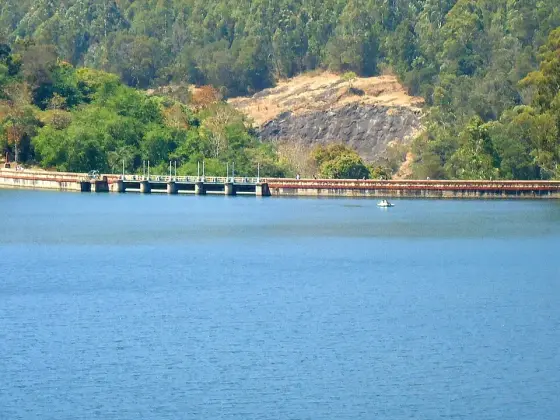 Kundala Dam across the far side of the lake.