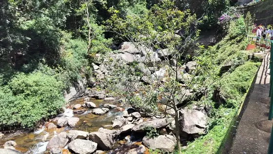 The boulder-filled stream below Lakkam Waterfalls.