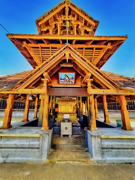 Timber framing beneath the entrance roof.