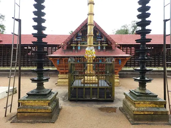 Flagstaff and lamp pillars in front of the shrine.