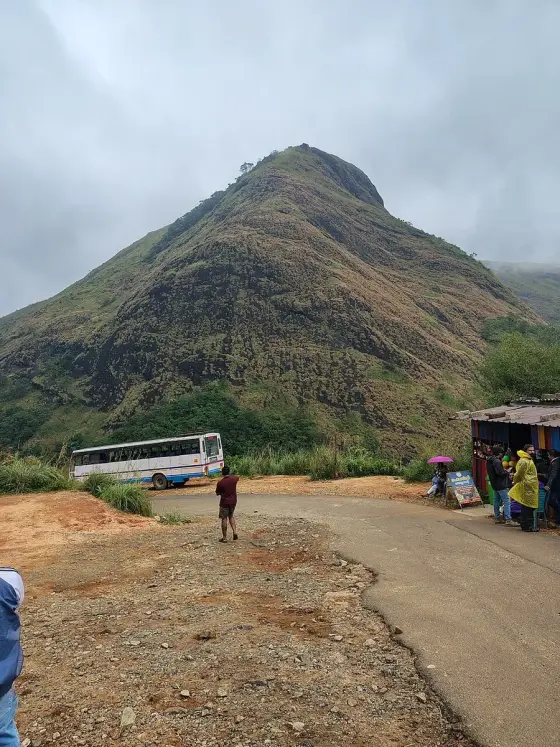 The approach road beneath the hill.