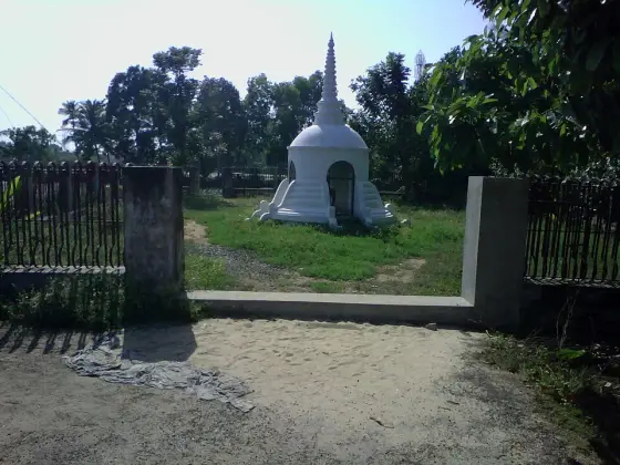 The entrance and garden around Karumadikuttan.