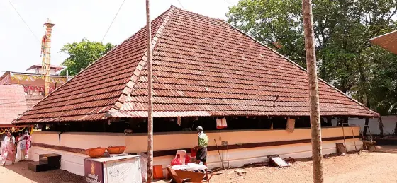A low tiled-roof building within the complex.