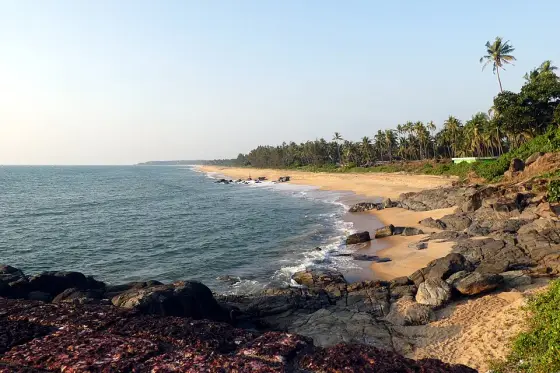 The rocky edge of the beach north of Bekal Fort.