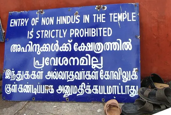 The posted restriction on entry by non-Hindus.