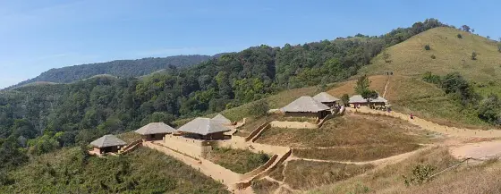 The village buildings spread across the hillside.