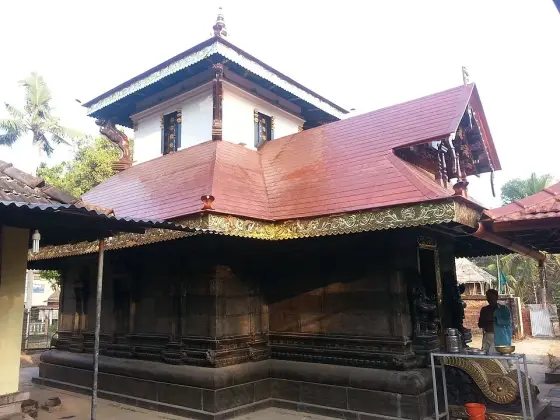 The timber and tiled-roof shrine at Thrikkapaleeswaram.