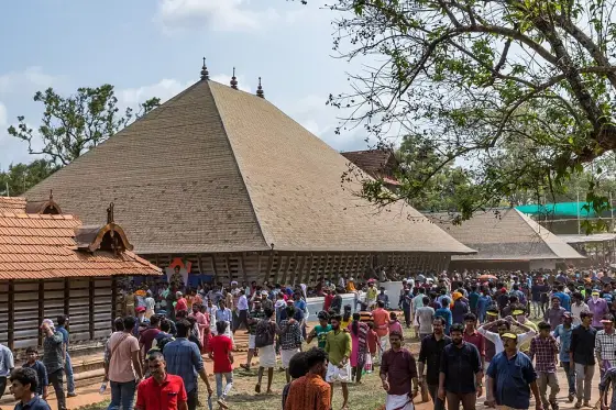 The broad pitched roof of the temple theatre.