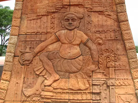 An artist’s relief of Pazhassi Raja on a laterite-coloured wall, photographed in 2008.
