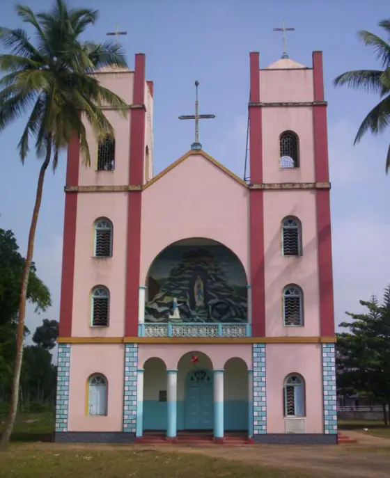 An archival view of Pallikkunnu Church’s pink facade and twin towers.