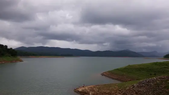 Dark clouds gather over Anchuruli’s reservoir coves and exposed shore.