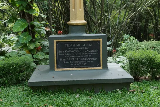 A commemorative plaque records the Teak Museum’s inauguration.