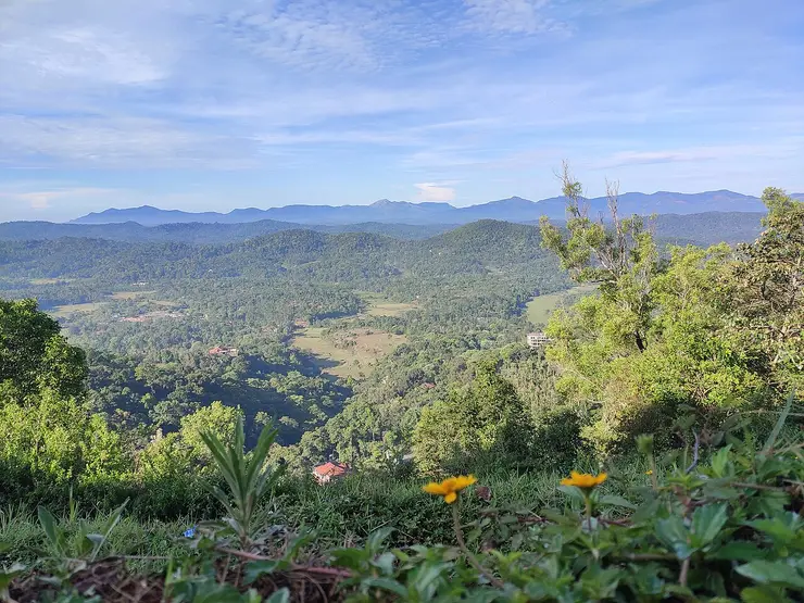 Layered Western Ghats valleys seen from Raja's Seat viewpoint in Madikeri, Coorg