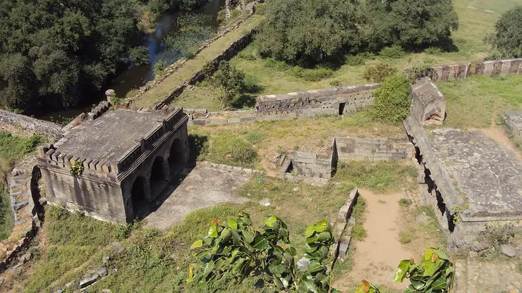 A high view over the rock-and-brick ramparts and inner enclosures of Ranjankudi Fort in Perambalur district