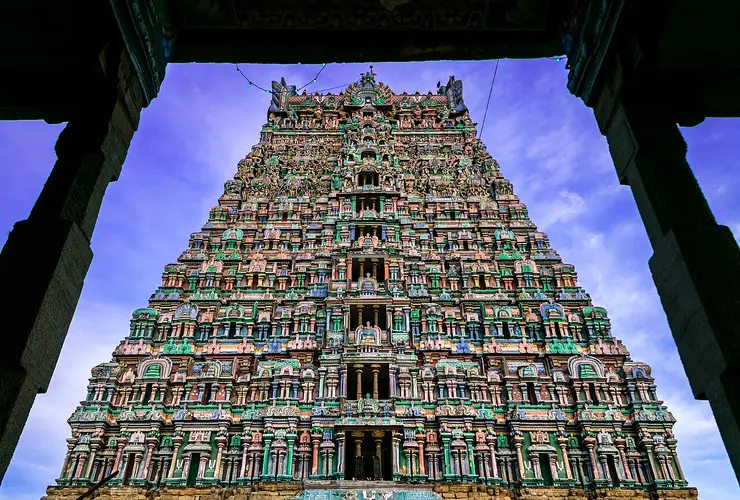 The tall, sculpture-covered rajagopuram of the Rajagopalaswamy temple at Mannargudi rising above the town
