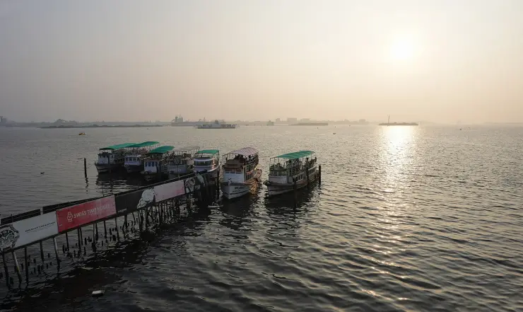 Tour boats on the Kochi backwaters at Marine Drive