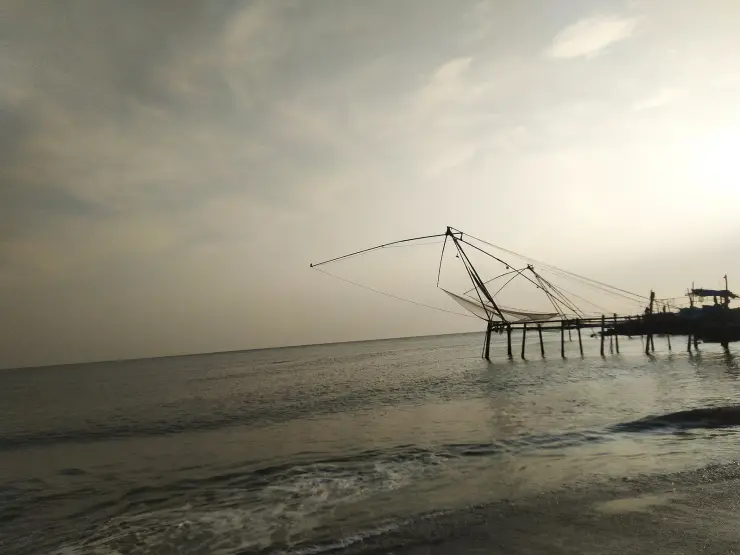 Chinese fishing nets on the estuary side at Munambam beach, Vypin