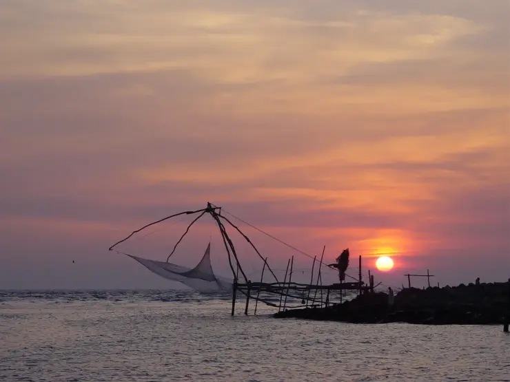 Sunset and a Chinese fishing net at Munambam beach, Vypin, Kochi