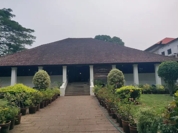 The Pazhassi Raja Archaeological Museum at East Hill, Kozhikode — the 1812 East Hill Bungalow with its Department of Archaeology signboard