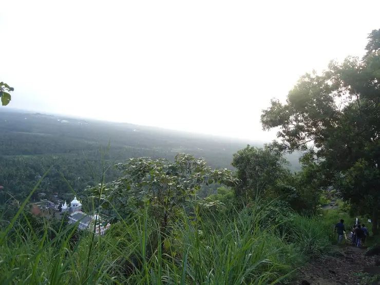 View from partway up Kanakamala hill over the Chalakudy plain, with the white parish church below