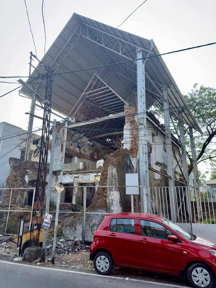 The ruined Kadavumbhagam Synagogue at Mattancherry, Kochi, under a temporary steel roof after its 2019 collapse