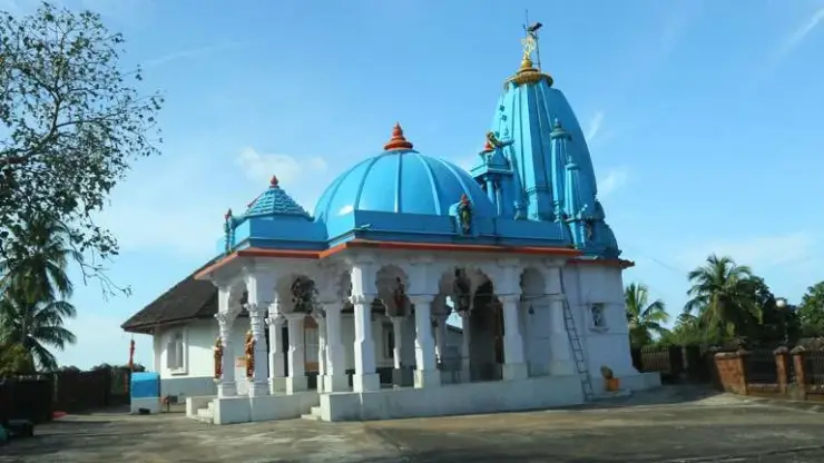 The blue domes and tower of the temple at Nithyananda Ashram in Kanhangad, a separate religious institution near Hosdurg Fort.