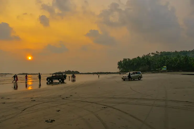 Cars on the sand at Muzhappilangad drive-in beach, Kannur